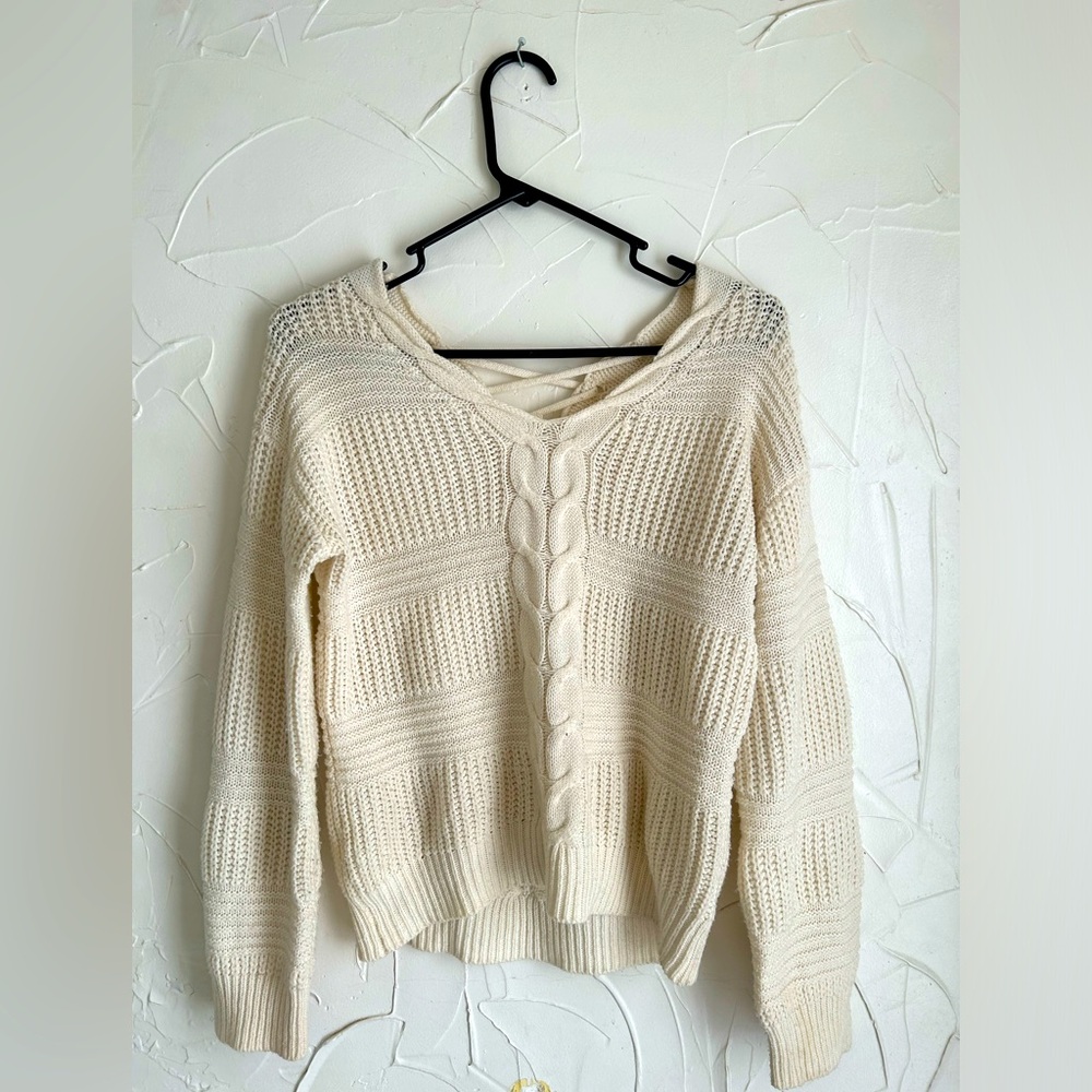 Small White Knit Sweater with Lowerback Design